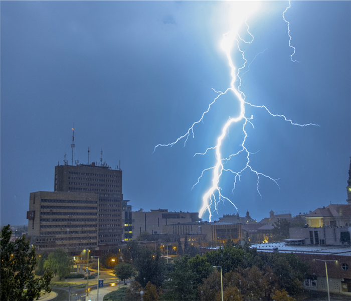 A lightning strike in a city.